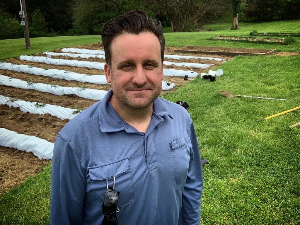 How To Grow A Garden Through Plastic Sheeting Our Homestead Adventures   Planting Plastic Chris Finished 1024x768 